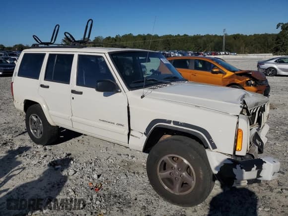 ✅ 1999 Jeep Cherokee Sport • VIN: 1J4FT68S8XL536398 • Lot: 87068025. Listed on Copart with Not provided. Free auction sales archive from the USA and detailed vehicle history report at DreamBid. Image 4.