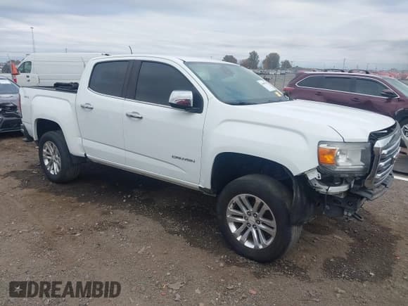✅ 2017 GMC Canyon 4WD SLT • VIN: 1GTG6DEN6H1249790 • Лот: 43609704. Опубликован ранее на IAAI с пробегом 141 693 миль. Бесплатный доступ к архиву аукционных продаж из США и подробный отчёт об истории автомобиля на DreamBid. Изображение 1.