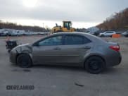 ✅ 2018 Toyota Corolla LE • VIN: 2T1BURHE9JC099877 • Lot: 43666812. Listed on IAAI with 179,795 mi. Free auction sales archive from the USA and detailed vehicle history report at DreamBid. Image 14.