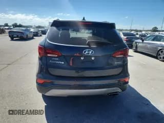 ✅ 2017 Hyundai Santa Fe 2.4L • VIN: 5NMZU3LBXHH011318 • Лот: 89848685. Опубликован ранее на Copart с пробегом 121 332 миль. Бесплатный доступ к архиву аукционных продаж из США и подробный отчёт об истории автомобиля на DreamBid. Изображение 6.
