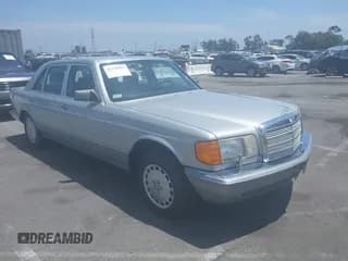 ✅ 1987 Mercedes-Benz 560 • VIN: WDBCA39D5HA348575 • Lot: 42518925. Listed on IAAI with 119,451 mi. Free auction sales archive from the USA and detailed vehicle history report at DreamBid. Image 1.