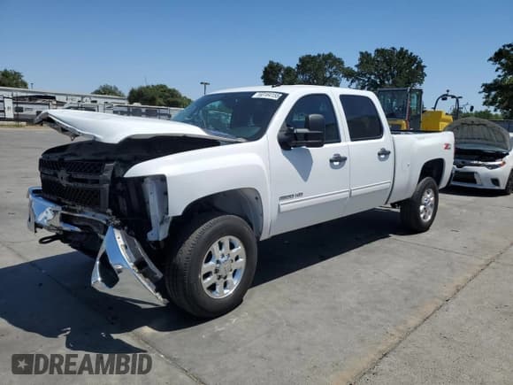 ✅ 2012 Chevrolet Silverado 2500HD LT • VIN: 1GC1KXC8XCF240442 • Лот: 60164155. Опубликован ранее на Copart с пробегом 99 920 миль. Бесплатный доступ к архиву аукционных продаж из США и подробный отчёт об истории автомобиля на DreamBid. Изображение 1.