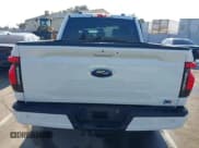 ✅ 2023 Ford F-150 Lightning Pro • VIN: 1FT6W1EV7PWG29037 • Lot: 43594548. Wystawiony na IAAI z przebiegiem 36 032 mil. Bezpłatny archiwum sprzedaży aukcyjnych z USA i szczegółowy raport historii pojazdu na DreamBid. Zdjęcie 16.