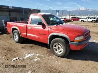 2001 Dodge Dakota z VIN 1B7FL26XX1S119536, wystawiony jako Copart lot #78751454 z przebiegiem 149 056 mil mil oraz Czysty tytuł • Clean title. Historia ofert i sprzedaży dostępna na DreamBid. Obrazek 4.