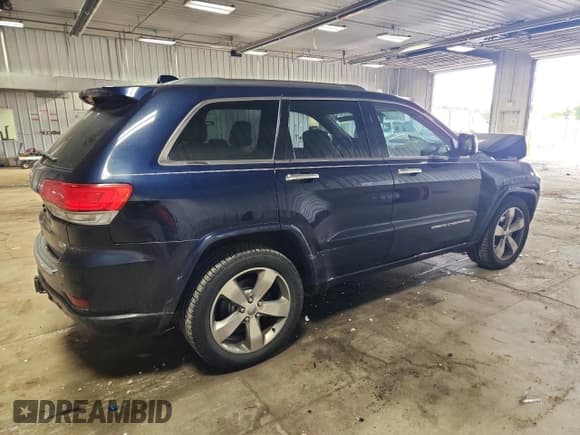✅ 2014 Jeep Grand Cherokee Overland • VIN: 1C4RJFCG1EC233696 • Lot: 86623075. Listed on Copart with 140,470 mi. Free auction sales archive from the USA and detailed vehicle history report at DreamBid. Image 3.