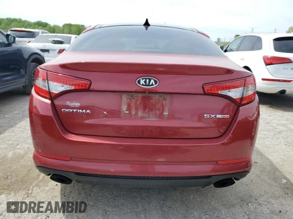 ✅ 2012 Kia Optima SX • VIN: 5XXGR4A64CG070859 • Лот: 67184165. Опубликован ранее на Copart с пробегом 170 772 миль. Бесплатный доступ к архиву аукционных продаж из США и подробный отчёт об истории автомобиля на DreamBid. Изображение 6.