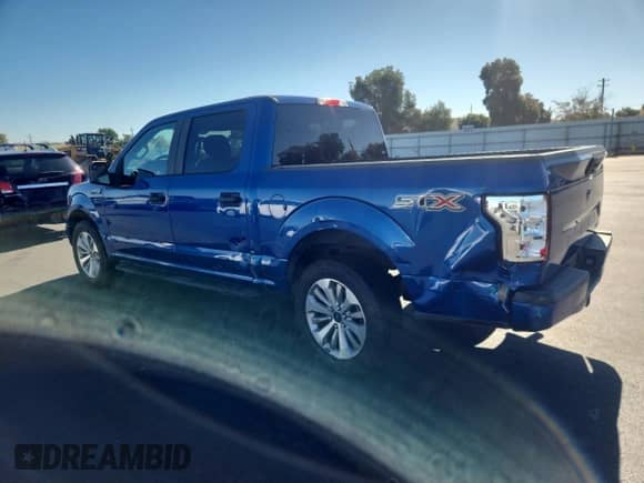2018 Ford F-150 XL with VIN 1FTEW1CP6JFC63739, listed as a Copart auction lot 90381505 with 28,861 mi miles and Salvage title. Bid and sale history available at DreamBid. Image 2.