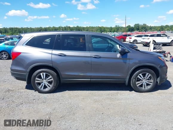 ✅ 2018 Honda Pilot EX-L • VIN: 5FNYF6H54JB063769 • Lot: 43058335. Listed on IAAI with 95,054 mi. Free auction sales archive from the USA and detailed vehicle history report at DreamBid. Image 13.