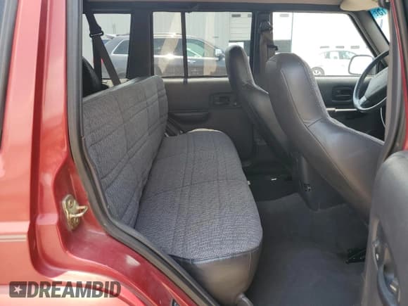 ✅ 1999 Jeep Cherokee Sport • VIN: 1J4FT68SXXL669549 • Lot: 62367015. Listed on Copart with 194,446 mi. Free auction sales archive from the USA and detailed vehicle history report at DreamBid. Image 11.