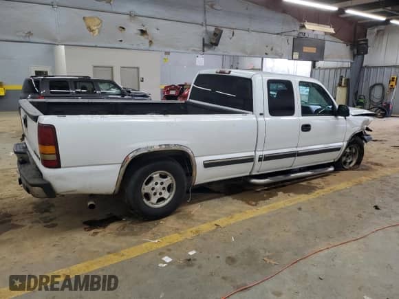 2002 Chevrolet Silverado 1500 with VIN 1GCEC19T72E234402, listed as a Copart auction lot 85130274 with 205,415 mi miles and Salvage title. Bid and sale history available at DreamBid. Image 3.