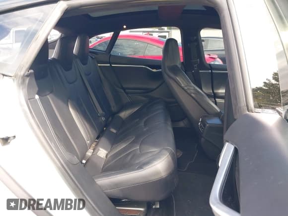 ✅ 2016 Tesla Model S 90D • VIN: 5YJSA1E40GF128340 • Lot: 43308256. Listed on IAAI with 89,394 mi. Free auction sales archive from the USA and detailed vehicle history report at DreamBid. Image 8.