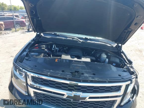 ✅ 2020 Chevrolet Suburban LT • VIN: 1GNSCHKC5LR102083 • Lot: 40551013. Wystawiony na IAAI z przebiegiem 105 555 mil. Bezpłatny archiwum sprzedaży aukcyjnych z USA i szczegółowy raport historii pojazdu na DreamBid. Zdjęcie 10.