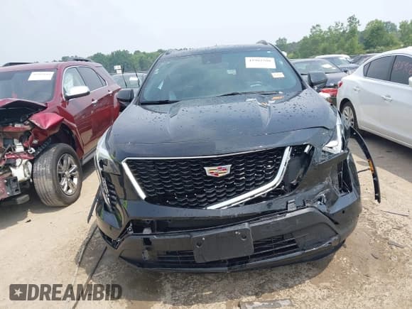 ✅ 2020 Cadillac XT4 AWD Sport • VIN: 1GYFZFR46LF078917 • Lot: 42902508. Listed on IAAI with 64,788 mi. Free auction sales archive from the USA and detailed vehicle history report at DreamBid. Image 12.