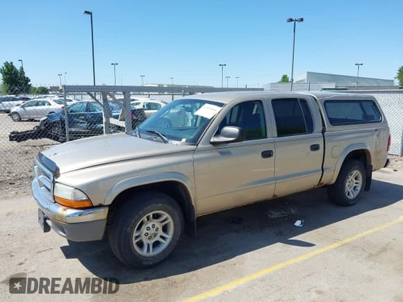 ✅ 2004 Dodge Dakota SLT • VIN: 1D7HL48N04S653798 • Lot: 42520546. Listed on IAAI with 115,259 mi. Free auction sales archive from the USA and detailed vehicle history report at DreamBid. Image 2.