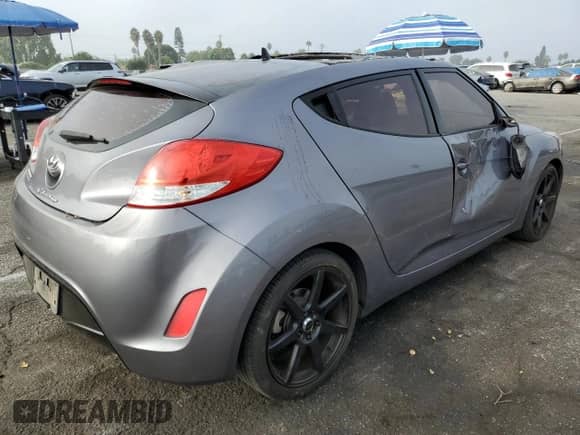 2016 Hyundai Veloster z VIN KMHTC6AD9GU260582, wystawiony jako Copart lot #71878294 z przebiegiem 83 155 mil mil oraz Szkoda całkowita • Salvage title. Historia ofert i sprzedaży dostępna na DreamBid. Obrazek 3.