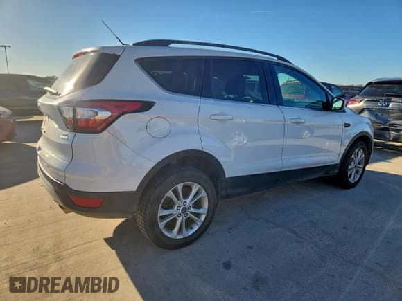 ✅ 2017 Ford Escape SE • VIN: 1FMCU0GD0HUD19554 • Lot: 96352765. Listed on Copart with 52,755 mi. Free auction sales archive from the USA and detailed vehicle history report at DreamBid. Image 3.