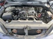 ✅ 2003 Kia Sorento LX • VIN: KNDJD733235121515 • Лот: 85347144. Опубликован ранее на Copart с пробегом 184 234 миль. Бесплатный доступ к архиву аукционных продаж из США и подробный отчёт об истории автомобиля на DreamBid. Изображение 11.