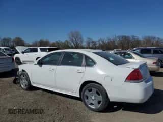 2014 Chevrolet Impala Police Police with VIN 2G1WD5E37E1152540, listed as a Copart auction lot 52751595 with 145,560 mi miles and Clean title. Bid and sale history available at DreamBid. Image 2.