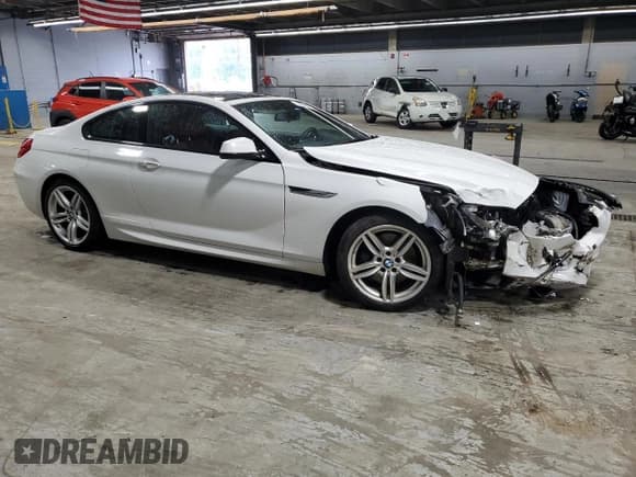 ✅ 2013 BMW 6 Series 650i xDrive • VIN: WBAYM1C58DDZ02671 • Лот: 59509955. Опубликован ранее на Copart с пробегом 76 630 миль. Бесплатный доступ к архиву аукционных продаж из США и подробный отчёт об истории автомобиля на DreamBid. Изображение 4.