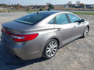 ✅ 2013 Hyundai Azera • VIN: KMHFH4JGXDA303112 • Лот: 43611021. Опубликован ранее на IAAI с пробегом 107 219 миль. Бесплатный доступ к архиву аукционных продаж из США и подробный отчёт об истории автомобиля на DreamBid. Изображение 4.