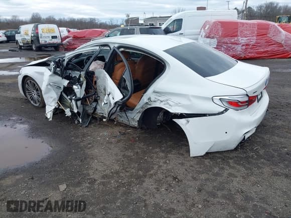 ✅ 2018 BMW 5 Series M550i xDrive • VIN: WBAJB9C56JB035929 • Lot: 41732048. Listed on IAAI with 87,896 mi. Free auction sales archive from the USA and detailed vehicle history report at DreamBid. Image 3.