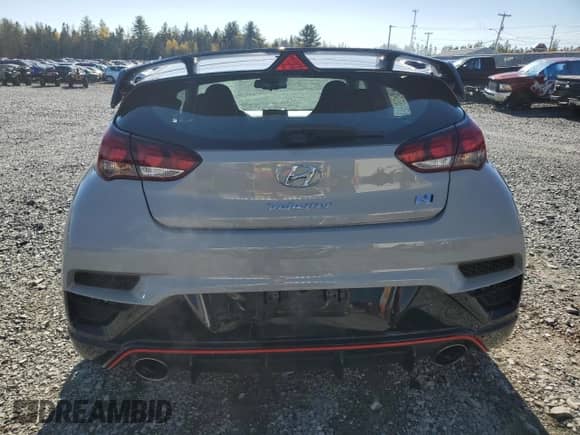 2022 Hyundai Veloster with VIN KMHT36AH7NU011682, listed as a Copart auction lot 77076454 with 73,461 mi miles and Salvage title. Bid and sale history available at DreamBid. Image 6.