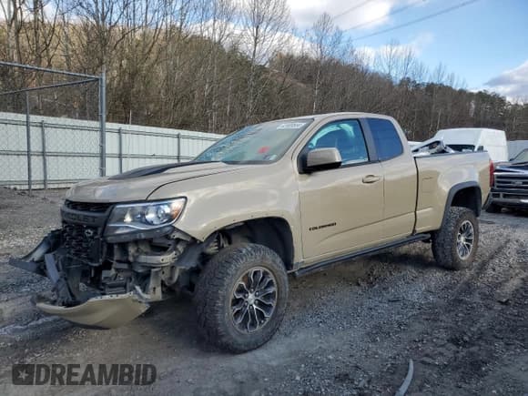 ✅ 2021 Chevrolet Colorado 4WD ZR2 • VIN: 1GCRTEEN2M1187631 • Лот: 82909564. Опубликован ранее на Copart с пробегом 52 950 миль. Бесплатный доступ к архиву аукционных продаж из США и подробный отчёт об истории автомобиля на DreamBid. Изображение 1.