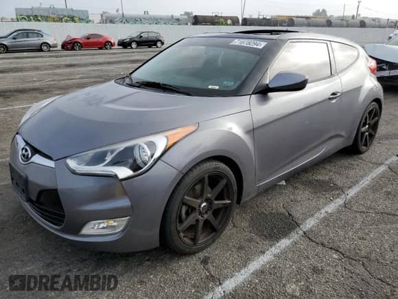 2016 Hyundai Veloster z VIN KMHTC6AD9GU260582, wystawiony jako Copart lot #71878294 z przebiegiem 83 155 mil mil oraz Szkoda całkowita • Salvage title. Historia ofert i sprzedaży dostępna na DreamBid. Obrazek 1.