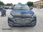 ✅ 2018 Hyundai Santa Fe 2.4L • VIN: 5NMZT3LB2JH066256 • Lot: 87420995. Listed on Copart with 127,034 mi. Free auction sales archive from the USA and detailed vehicle history report at DreamBid. Image 5.