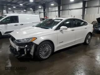 ✅ 2013 Ford Fusion Titanium Hybrid • VIN: 3FA6P0RU7DR309990 • Lot: 69105425. Wystawiony na Copart z przebiegiem 124 499 mil. Bezpłatny archiwum sprzedaży aukcyjnych z USA i szczegółowy raport historii pojazdu na DreamBid. Zdjęcie 1.