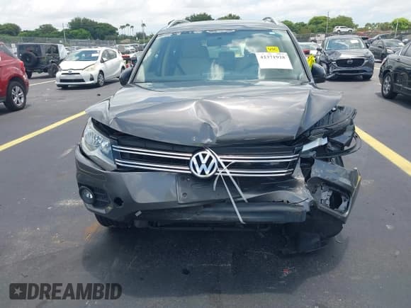 ✅ 2013 Volkswagen Tiguan S • VIN: WVGAV3AX4DW588227 • Лот: 42371928. Опубликован ранее на IAAI с пробегом 132 239 миль. Бесплатный доступ к архиву аукционных продаж из США и подробный отчёт об истории автомобиля на DreamBid. Изображение 6.