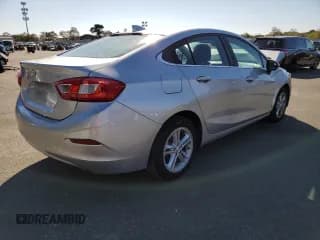 ✅ 2017 Chevrolet Cruze LT • VIN: 1G1BE5SM9H7219297 • Lot: 64232272. Listed on Copart with 64,316 mi. Free auction sales archive from the USA and detailed vehicle history report at DreamBid. Image 4.