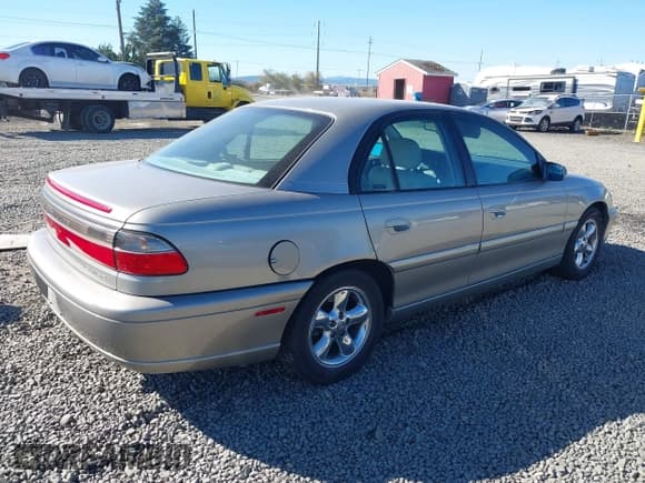 ✅ 1999 Cadillac Catera • VIN: W06VR52R3XR015538 • Lot: 43436028. Wystawiony na IAAI z przebiegiem 172 334 mil. Bezpłatny archiwum sprzedaży aukcyjnych z USA i szczegółowy raport historii pojazdu na DreamBid. Zdjęcie 4.