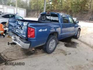 2005 Dodge Dakota SLT с VIN 1D7HW48N85S112443, выставлен на аукционе Copart как лот 79257864 с пробегом 194 022 миль миль и Списание • Salvage title. История ставок и продаж доступна на DreamBid. Изображение 3.