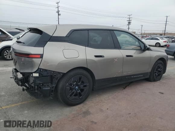 ✅ 2023 BMW iX xDrive50 • VIN: WB523CF06PCM79067 • Lot: 59855705. Listed on Copart with 31,558 mi. Free auction sales archive from the USA and detailed vehicle history report at DreamBid. Image 3.