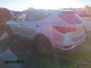 ✅ 2017 Hyundai Santa Fe 2.4L • VIN: 5XYZTDLB4HG391663 • Lot: 43924601. Listed on IAAI with 118,778 mi. Free auction sales archive from the USA and detailed vehicle history report at DreamBid. Image 3.