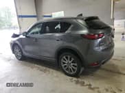 ✅ 2021 Mazda CX-5 Grand Touring • VIN: JM3KFADM9M0376686 • Lot: 84592915. Wystawiony na Copart z przebiegiem 33 301 mil. Bezpłatny archiwum sprzedaży aukcyjnych z USA i szczegółowy raport historii pojazdu na DreamBid. Zdjęcie 2.