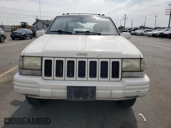 ✅ 1996 Jeep Grand Cherokee Limited • VIN: 1J4EZ78YXTC122036 • Lot: 70358055. Listed on Copart with 185,601 mi. Free auction sales archive from the USA and detailed vehicle history report at DreamBid. Image 5.