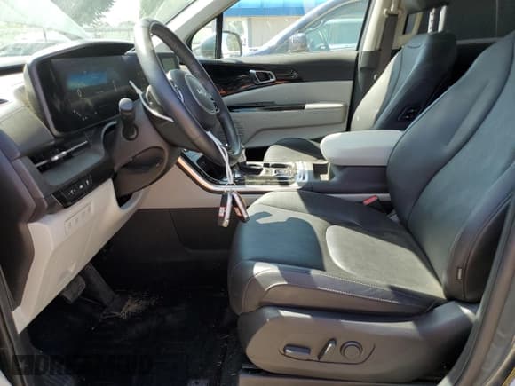 ✅ 2024 Kia Carnival SX • VIN: KNDNE5H39R6318793 • Лот: 65808655. Опубликован ранее на Copart с пробегом 57 648 миль. Бесплатный доступ к архиву аукционных продаж из США и подробный отчёт об истории автомобиля на DreamBid. Изображение 7.