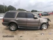 ✅ 2002 Lincoln Navigator • VIN: 5LMFU28R72LJ10938 • Lot: 36954745. Wystawiony na IAAI z przebiegiem Nie podano. Bezpłatny archiwum sprzedaży aukcyjnych z USA i szczegółowy raport historii pojazdu na DreamBid. Zdjęcie 13.