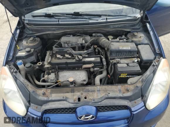 2007 Hyundai Accent GS z VIN KMHCM36C67U002872, wystawiony jako Copart lot #67707265 z przebiegiem 114 995 mil mil oraz Szkoda całkowita • Salvage title. Historia ofert i sprzedaży dostępna na DreamBid. Obrazek 11.
