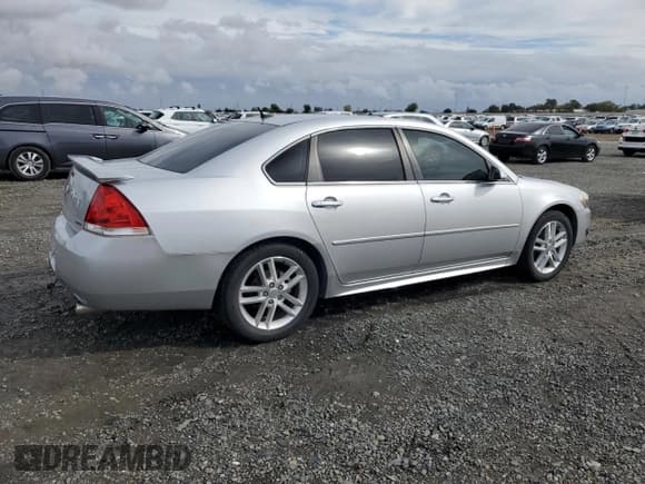 ✅ 2014 Chevrolet Impala LTZ • VIN: 2G1WC5E38E1147222 • Lot: 82001215. Listed on Copart with 160,275 mi. Free auction sales archive from the USA and detailed vehicle history report at DreamBid. Image 3.