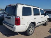 ✅ 2007 Jeep Commander Sport • VIN: 1J8HH48K07C587312 • Lot: 42004278. Listed on IAAI with 208,390 mi. Free auction sales archive from the USA and detailed vehicle history report at DreamBid. Image 4.