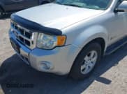 ✅ 2009 Ford Escape Hybrid • VIN: 1FMCU593X9KA59775 • Lot: 42763464. Listed on IAAI with 142,396 mi. Free auction sales archive from the USA and detailed vehicle history report at DreamBid. Image 6.