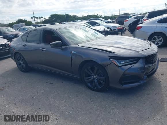 ✅ 2021 Acura TLX w/A-Spec Package • VIN: 19UUB5F56MA015700 • Lot: 40991800. Listed on IAAI with 21,993 mi. Free auction sales archive from the USA and detailed vehicle history report at DreamBid. Image 1.
