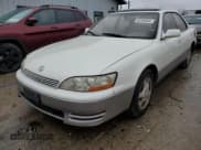✅ 1994 Lexus ES 300 • VIN: JT8GK13TXR0062571 • Lot: 82169594. Listed on Copart with 185,501 mi. Free auction sales archive from the USA and detailed vehicle history report at DreamBid. Image 1.