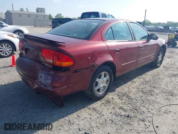 ✅ 2002 Oldsmobile Alero GL1 • VIN: 1G3NL52E02C215561 • Lot: 42230290. Wystawiony na IAAI z przebiegiem 177 176 mil. Bezpłatny archiwum sprzedaży aukcyjnych z USA i szczegółowy raport historii pojazdu na DreamBid. Zdjęcie 4.
