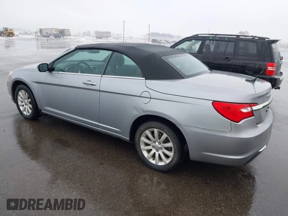 ✅ 2014 Chrysler 200 Touring • VIN: 1C3BCBEB3EN158059 • Lot: 41206584. Listed on IAAI with 97,389 mi. Free auction sales archive from the USA and detailed vehicle history report at DreamBid. Image 3.