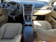 ✅ 2016 Ford Fusion SE Hybrid • VIN: 3FA6P0LU9GR157112 • Lot: 80173065. Listed on Copart with 84,969 mi. Free auction sales archive from the USA and detailed vehicle history report at DreamBid. Image 8.