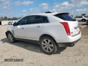 ✅ 2015 Cadillac SRX Performance Collection • VIN: 3GYFNCE39FS607266 • Lot: 90239145. Listed on Copart with 124,658 mi. Free auction sales archive from the USA and detailed vehicle history report at DreamBid. Image 2.